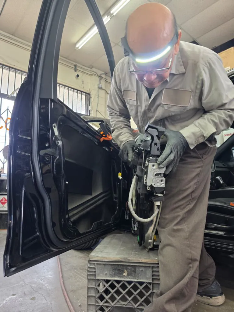 Inside Hovee's Auto Body & Paint repair shop in Chatsworth, CA
